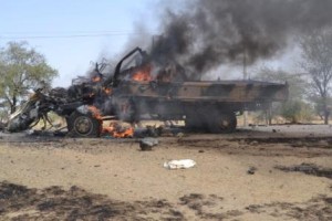 A terrorists vehicle set ablaze by troops copy