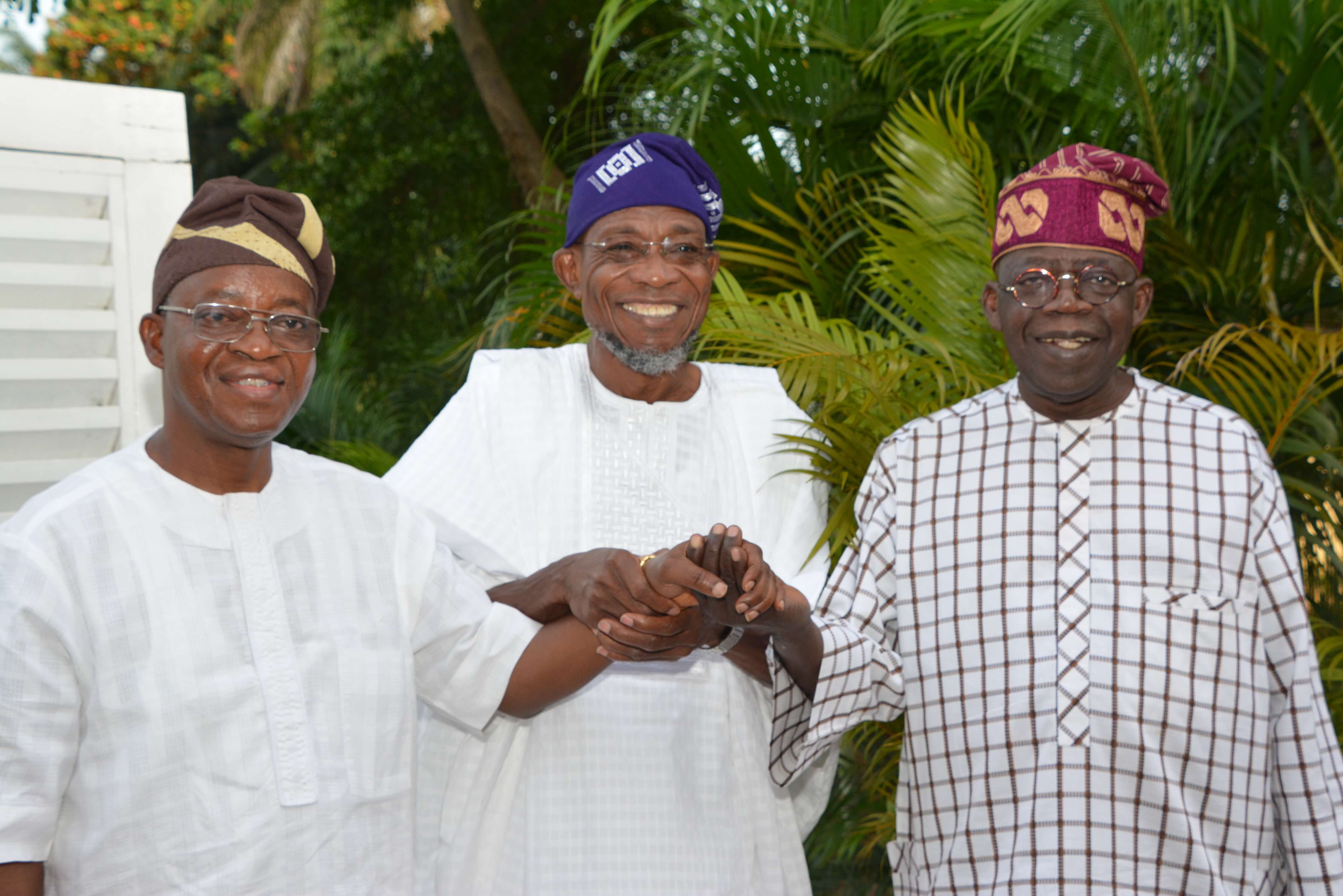 Photo as Gov. Aregbesola hands over Osun Governor-Elect to Tinubu in 