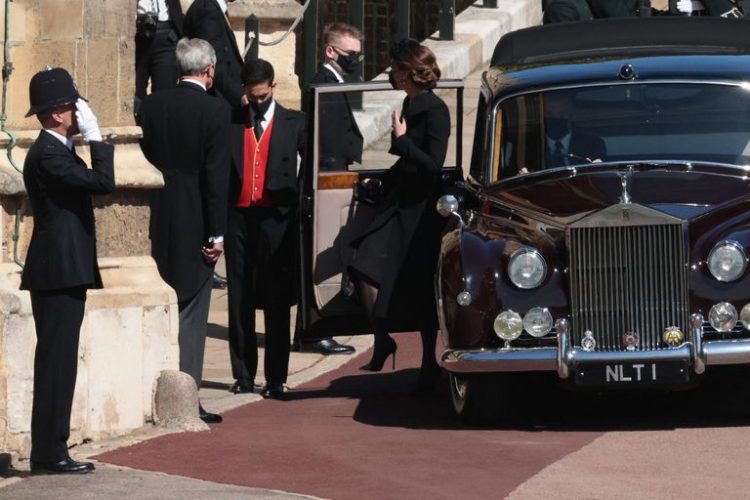 Photos: Queen Elizabeth sits alone at funeral for Prince Philip as she ...