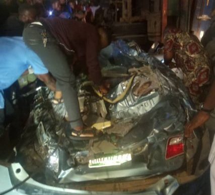 Four survive after truck bearing 40ft container falls on their car -