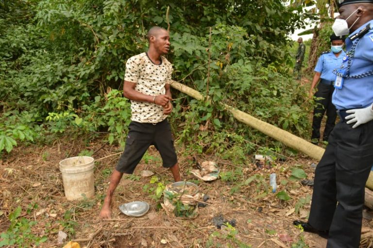 Remains of Quadri Salami being exhumed