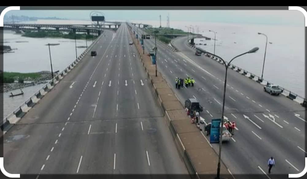 Lagos bus accident throws two persons into lagoon + Video